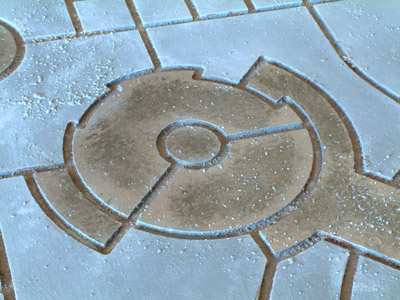 Close-up of one of the round things in the pavement